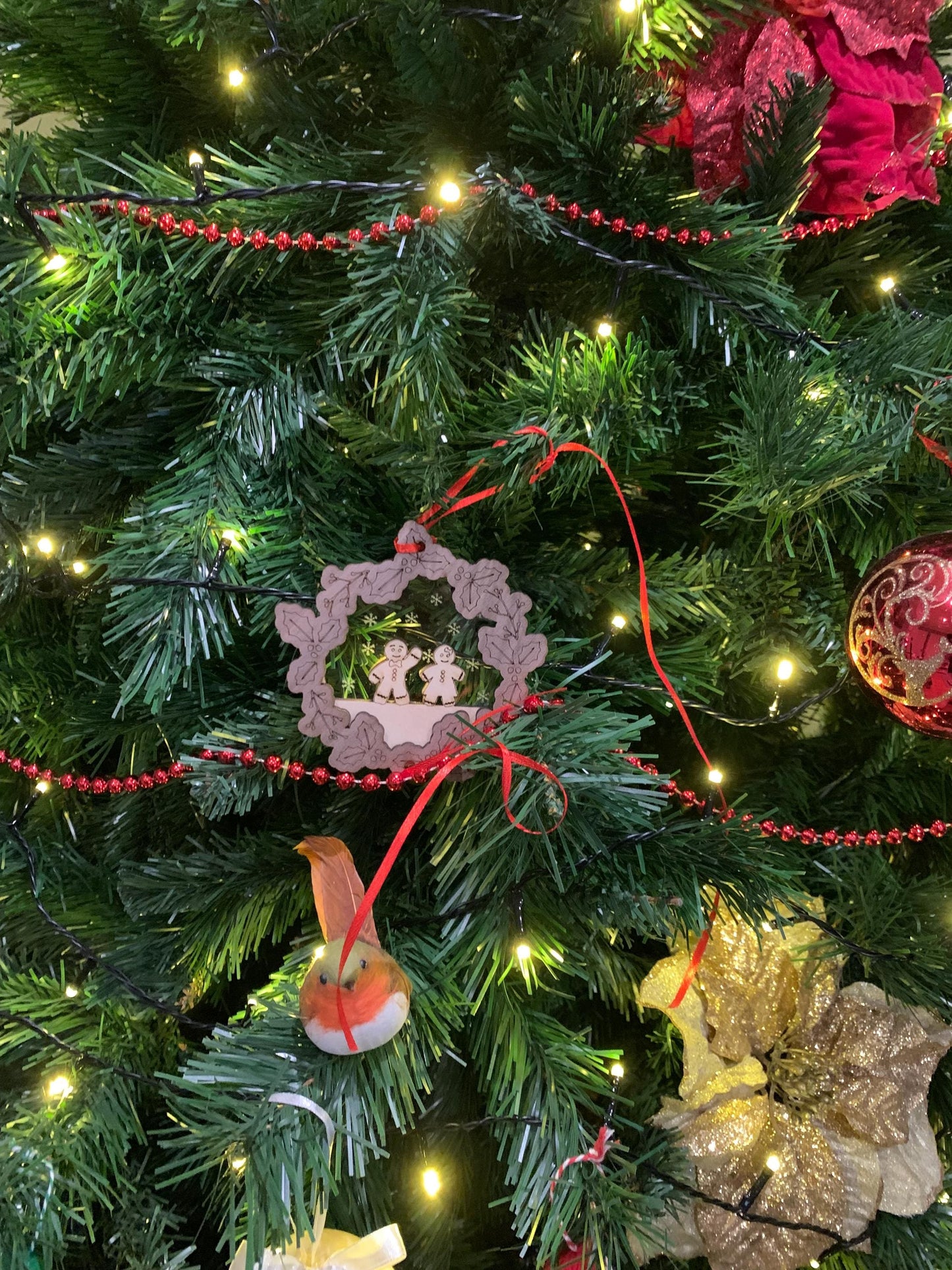 Gingerbread people bauble