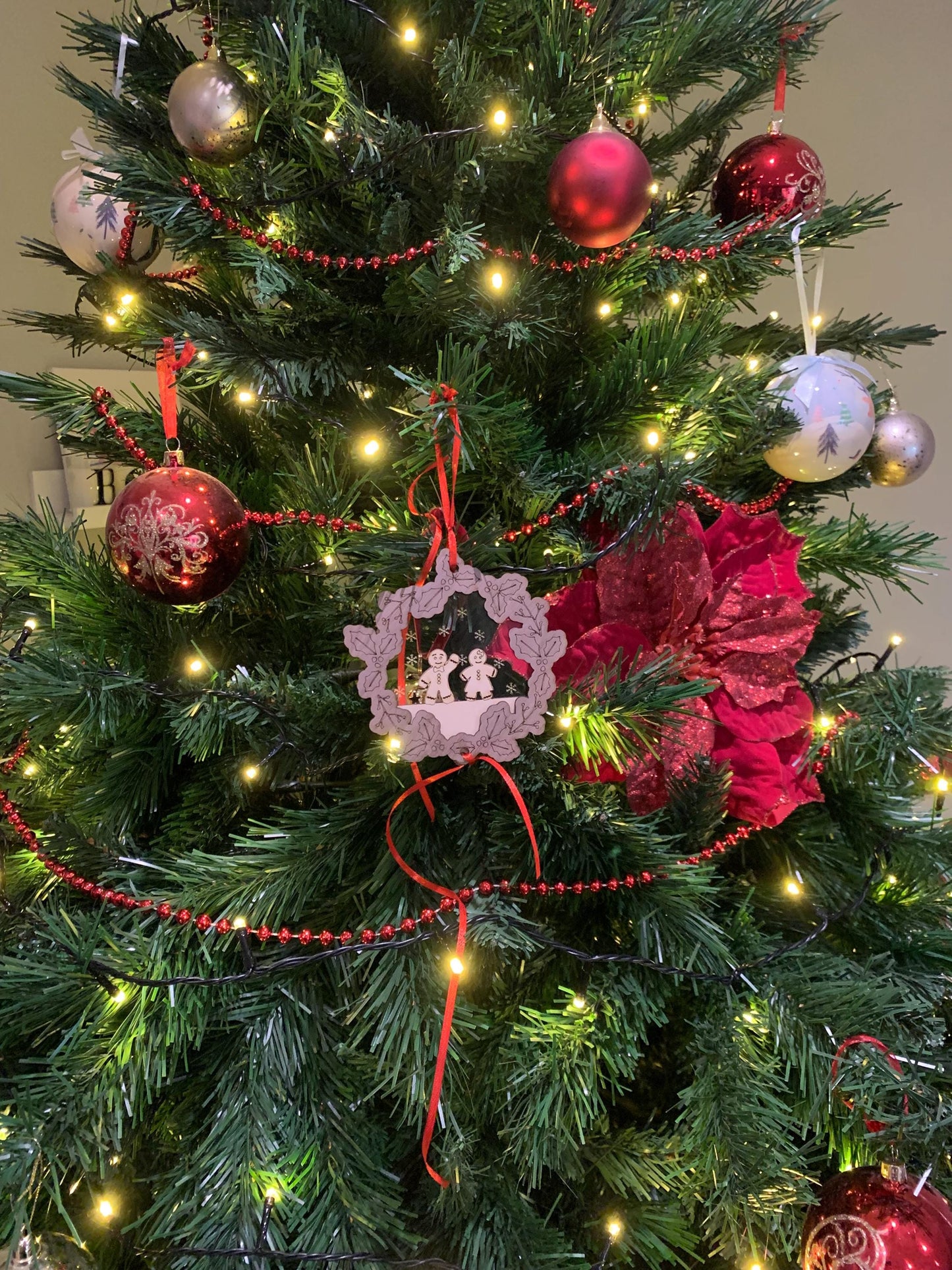 Gingerbread people bauble